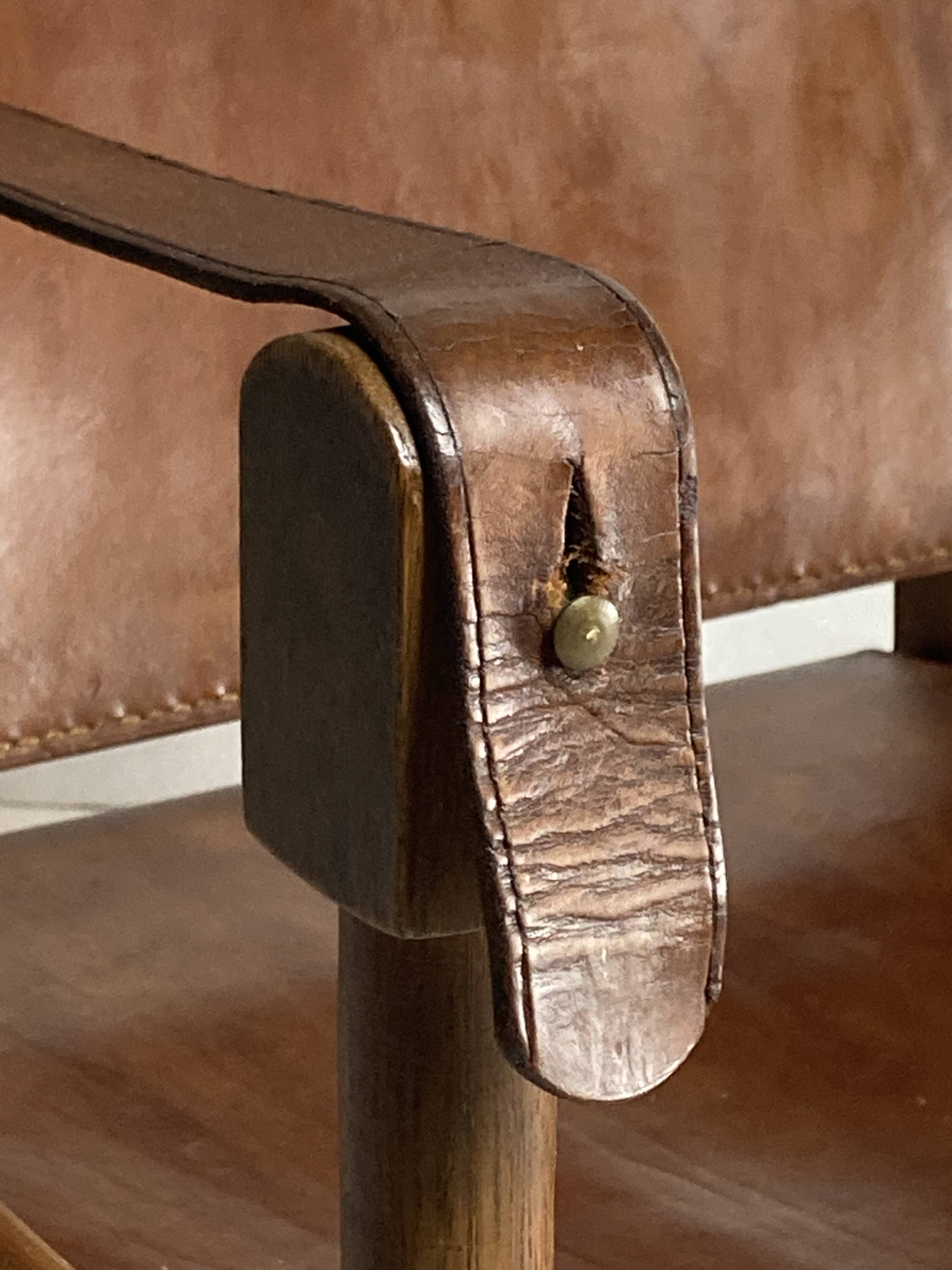 Leather safari armchair by Wilhelm Kienzle for Wohnbedarf, 1950s