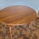 Folding wooden round table
