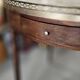 Louis XVI style bouillotte table in mahogany, early 20th century.