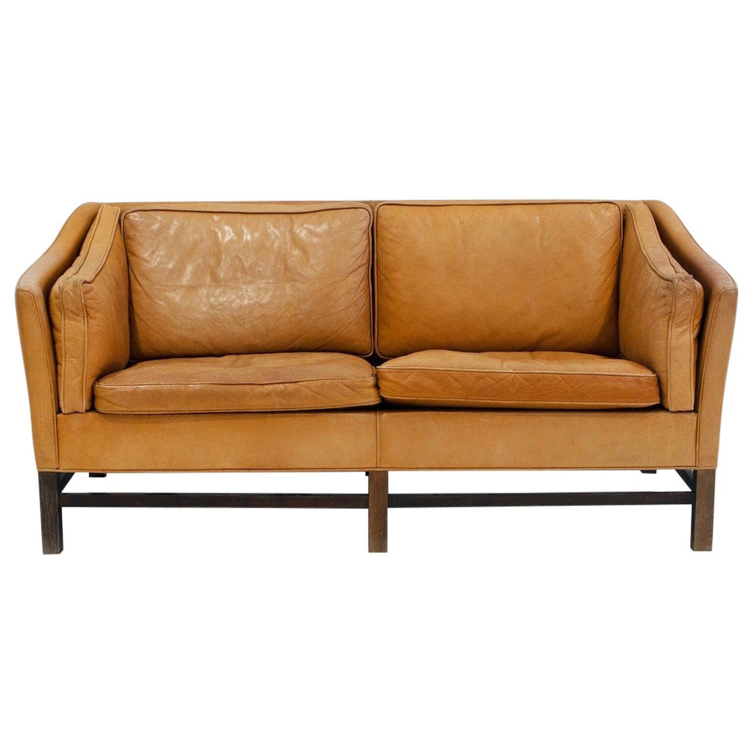 Two-seater caramel brown leather sofa The Moderns