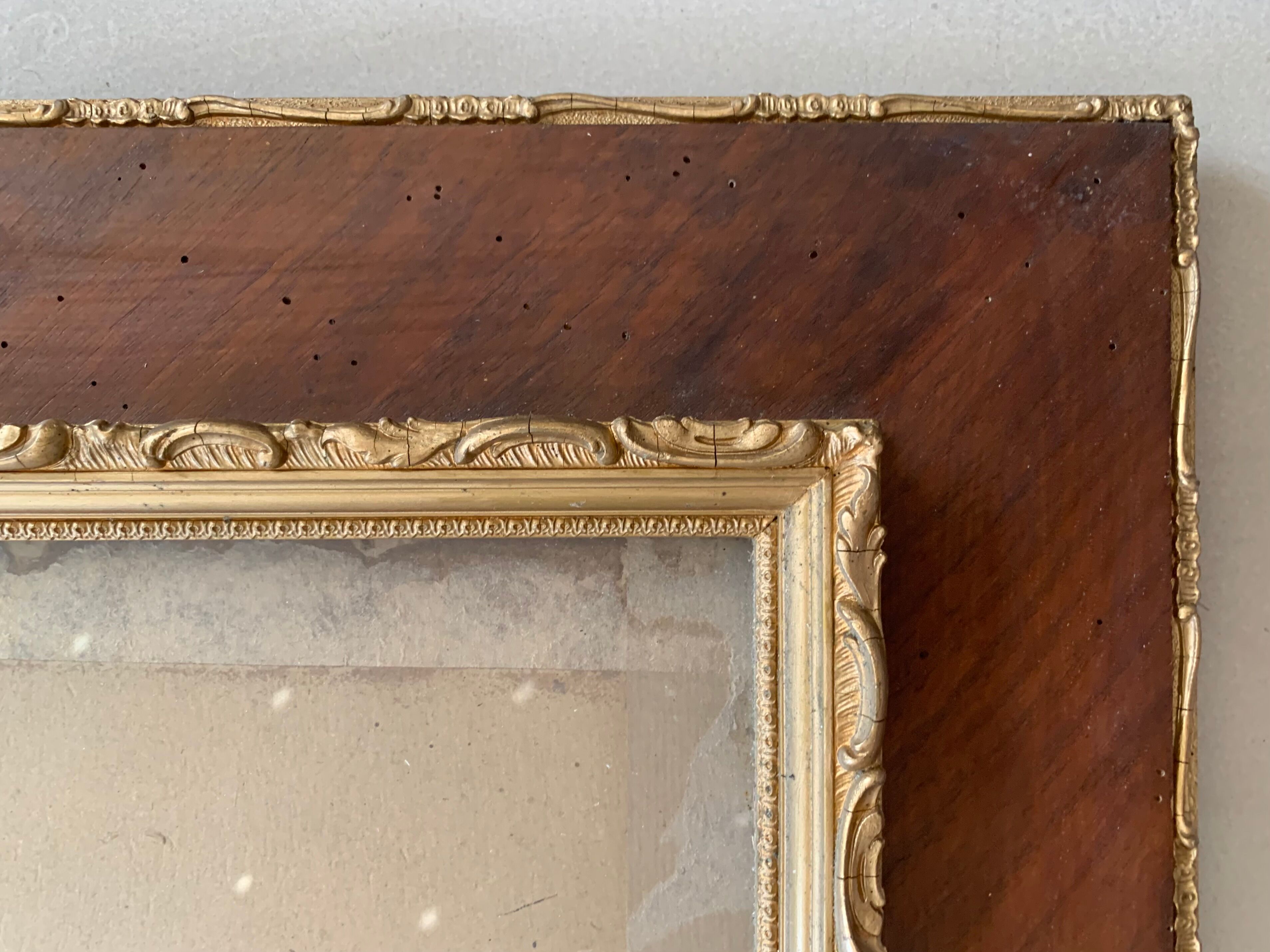 Large old wood and gilded frame