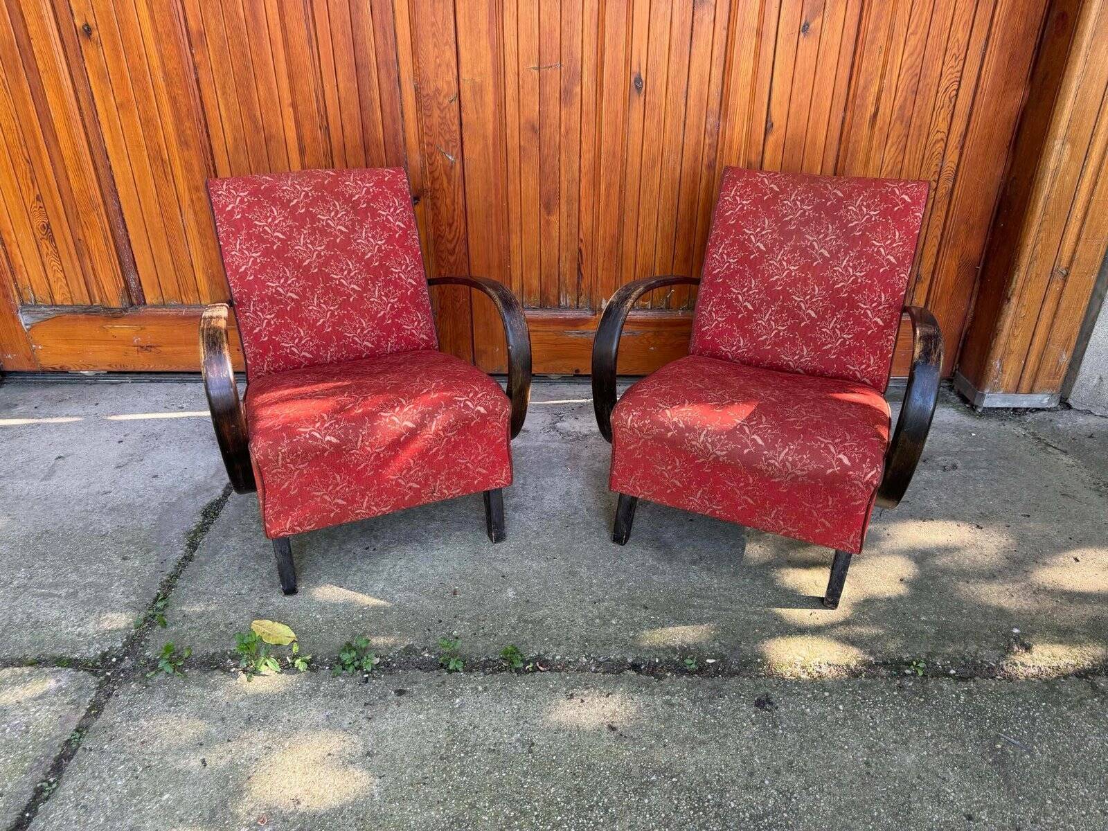 Pair of Art Deco burgundy armchairs in curved wood and fabric by Jindrich Halabala (1930s)