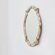 Large 20th century Venetian style trapezoidal brass and mosaic mirror