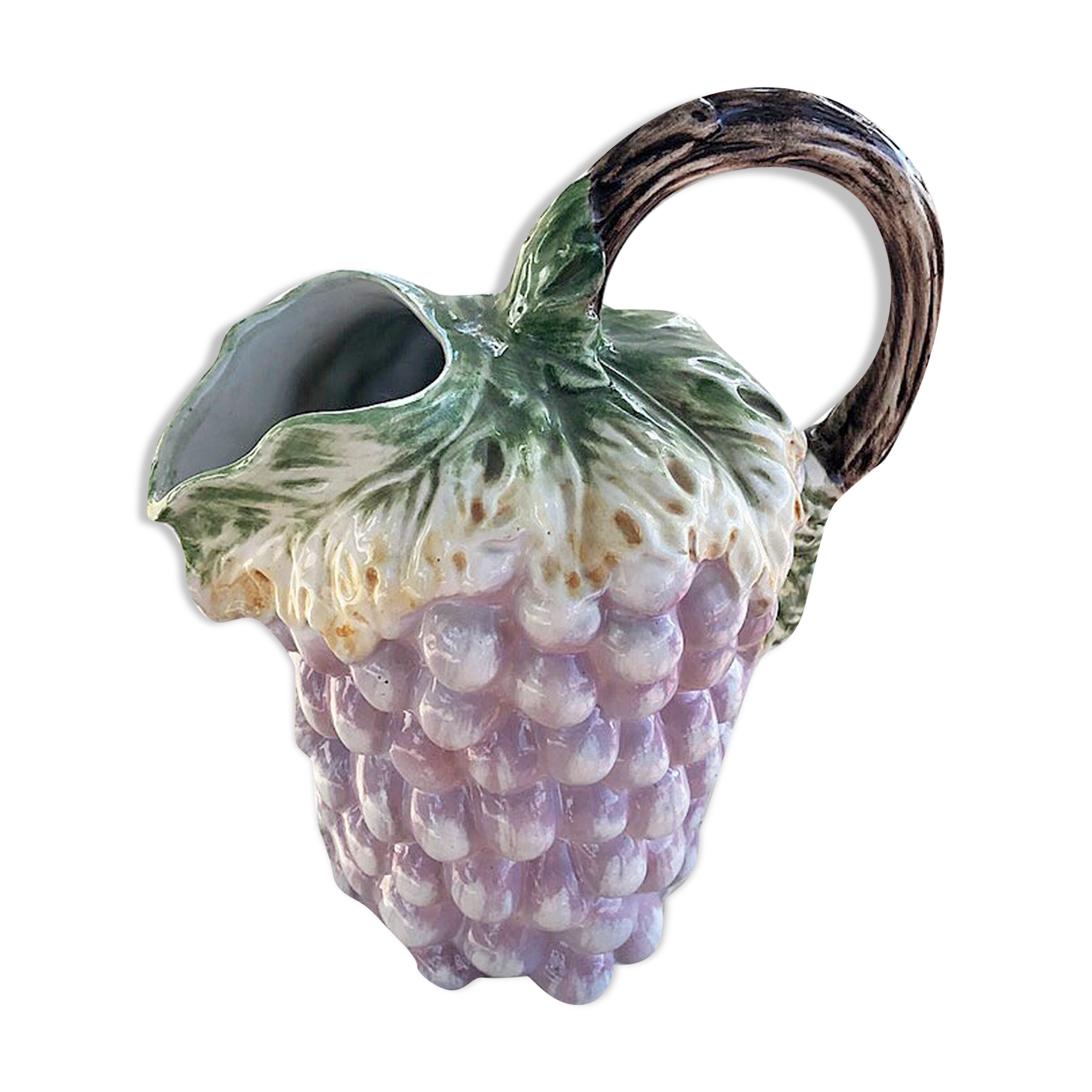 Old bunch pitcher of dabbling grapes