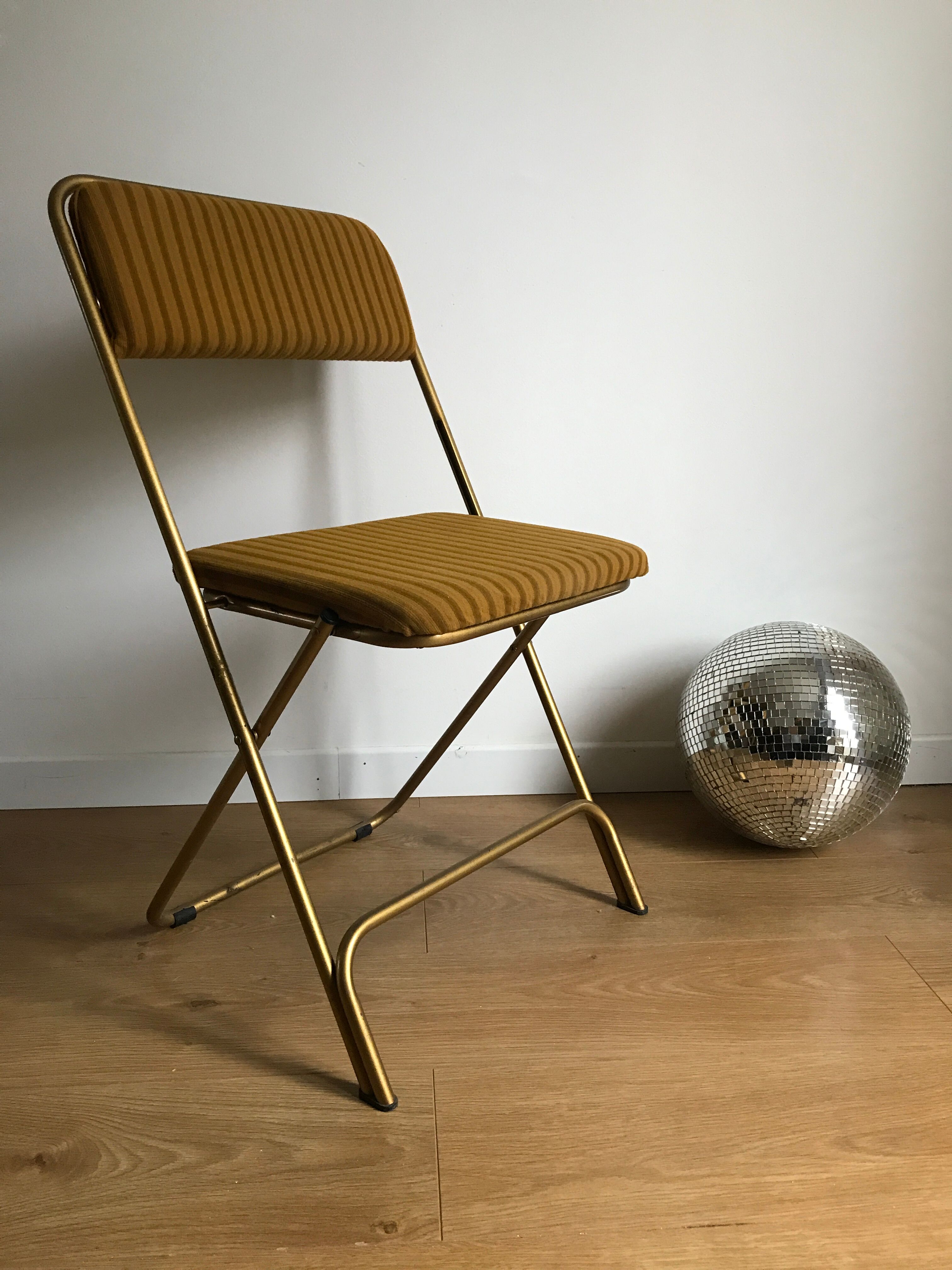 Vintage folding chair lafuma chantazur with striped gold fabric