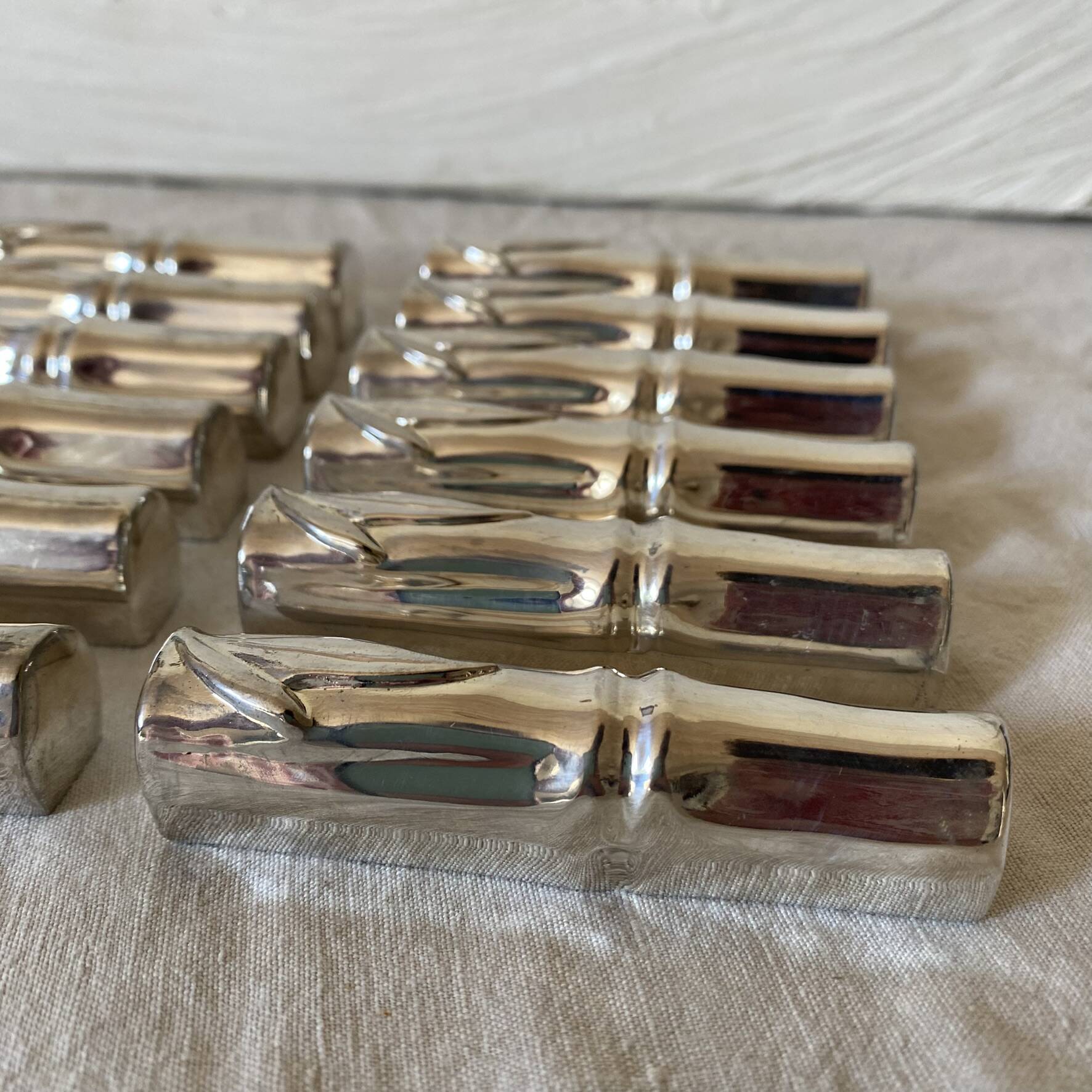 Silver bamboo knife rests from the 1980s.