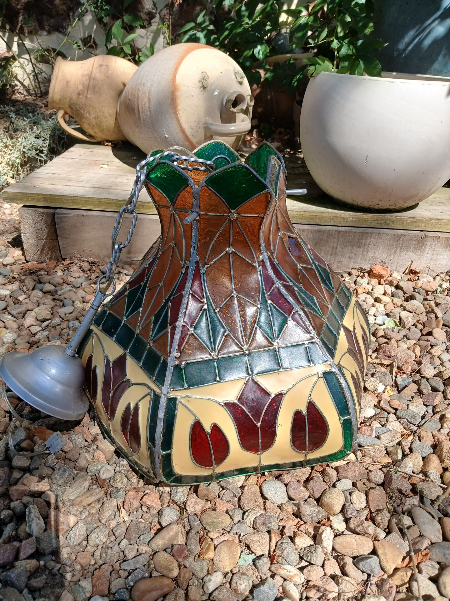 Vintage pendant light with multicoloured stained glass.