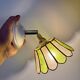 Vintage wall lamp with a green and pink mother-of-pearl lampshade