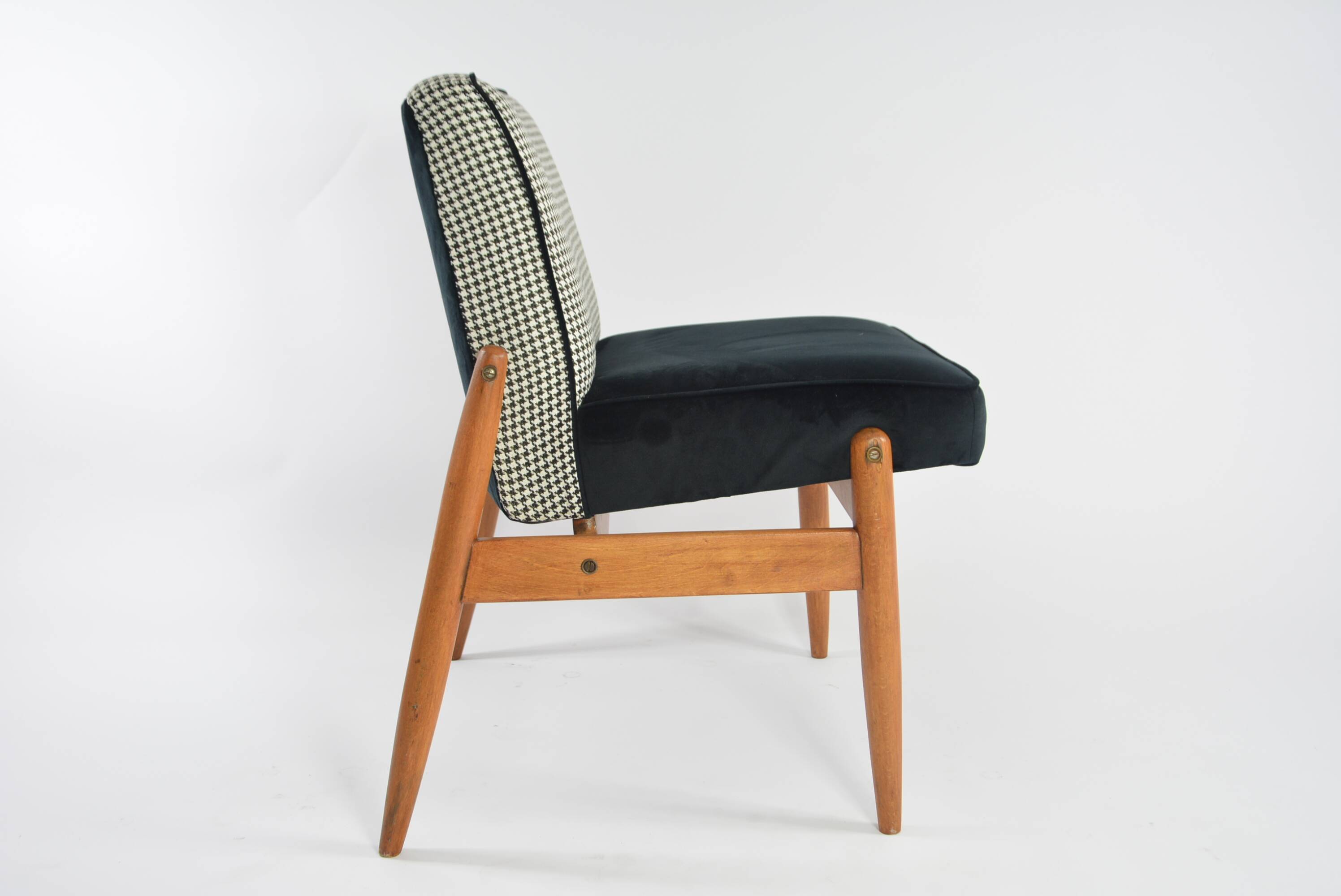 Black and white armchair without armrests