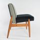 Black and white armchair without armrests