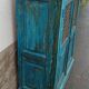Old wooden cabinet with doors with grille