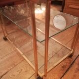 Trolley on wheels in gilded brass and beveled glass