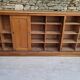 Oak workshop furniture with sliding doors.