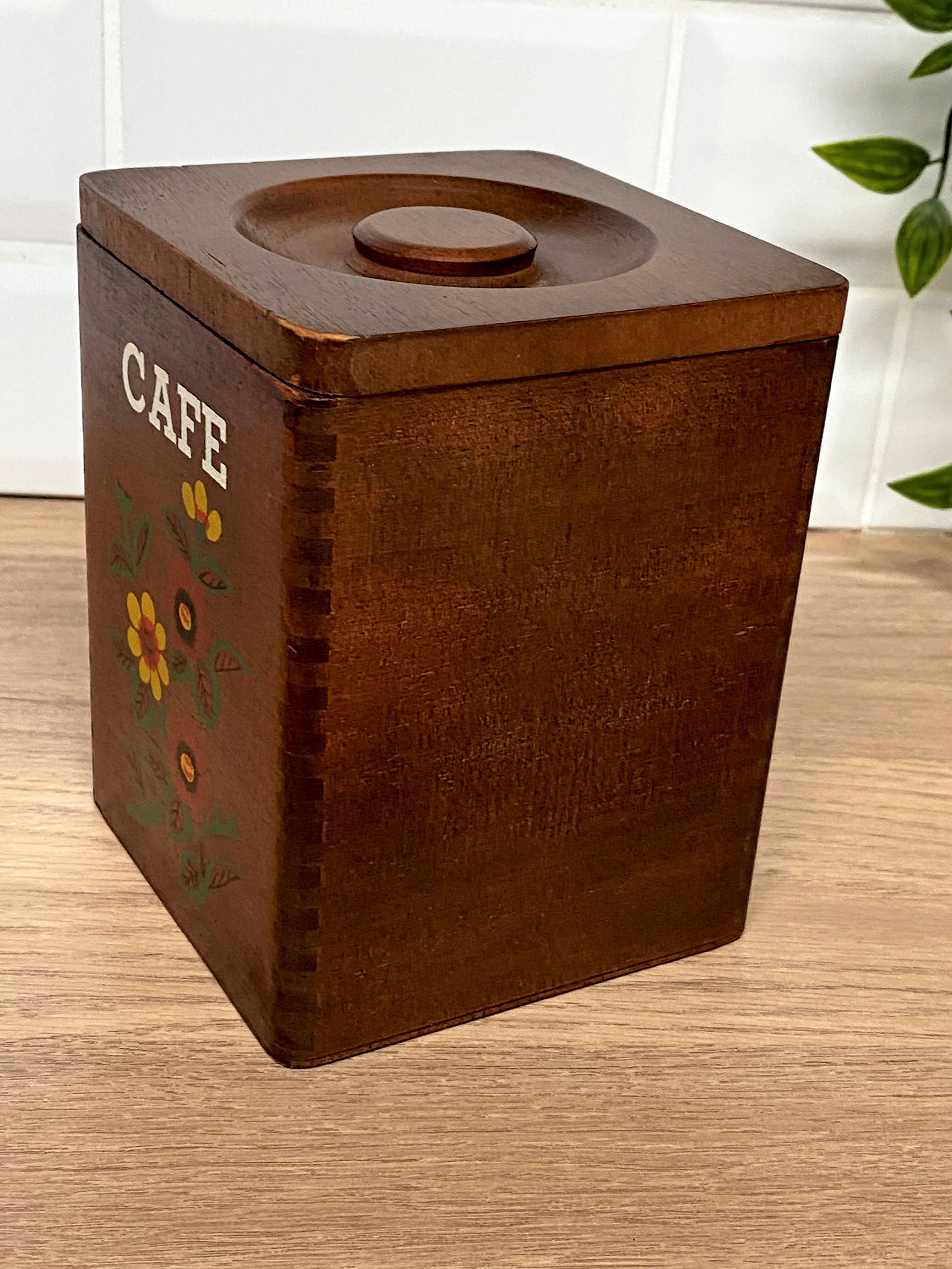 Série de 4 pots à épices en bois