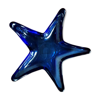 Empty blue star glass pocket