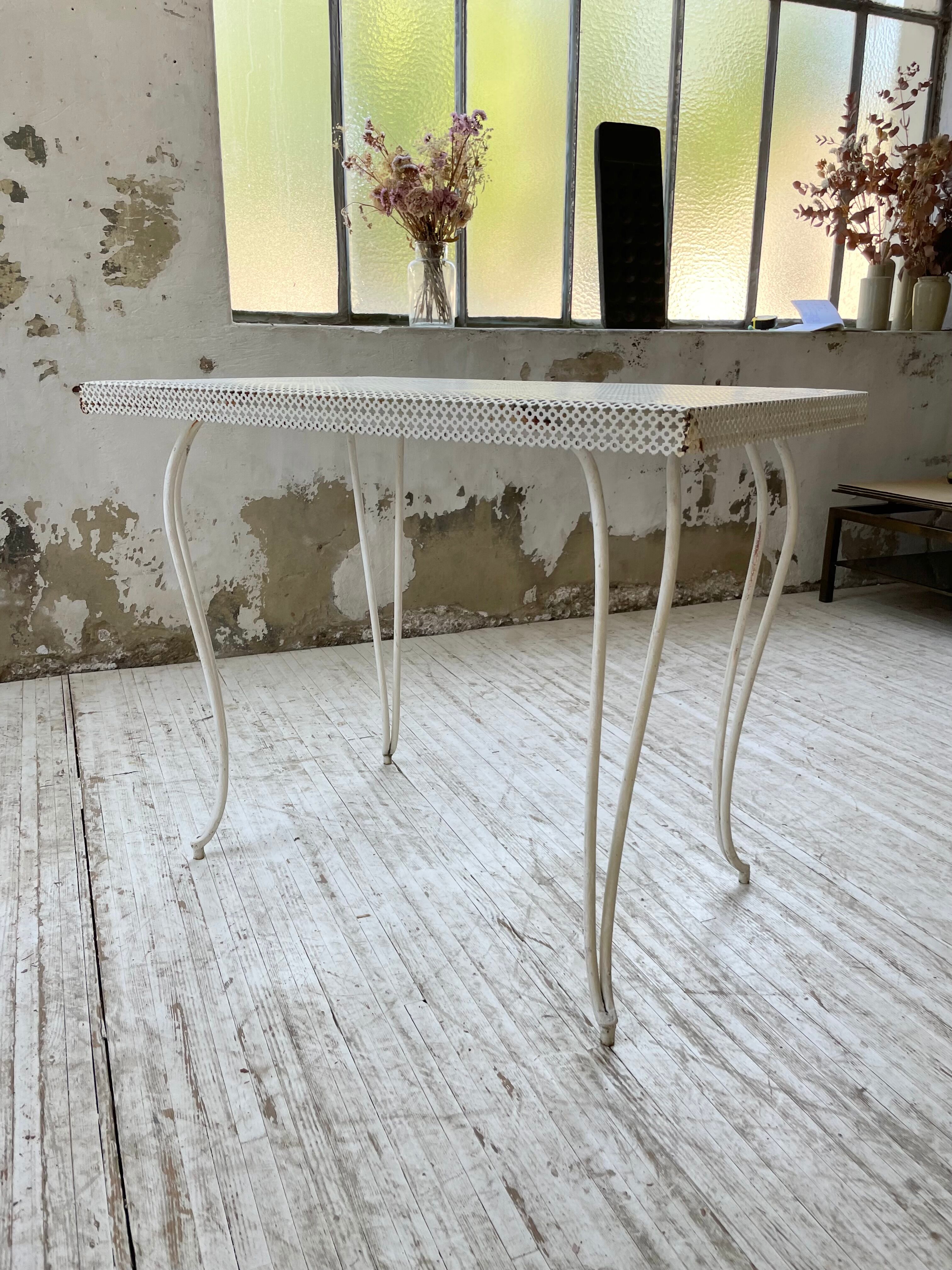 Perforated garden dining table
