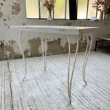 Perforated garden dining table