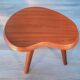 "Tripod plant stand 'bean', solid mahogany from the 1950s."