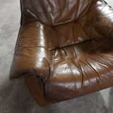 Armchairs in leather and vintage wood 70's