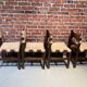 Set of four wooden and leather chairs from Maison Regain