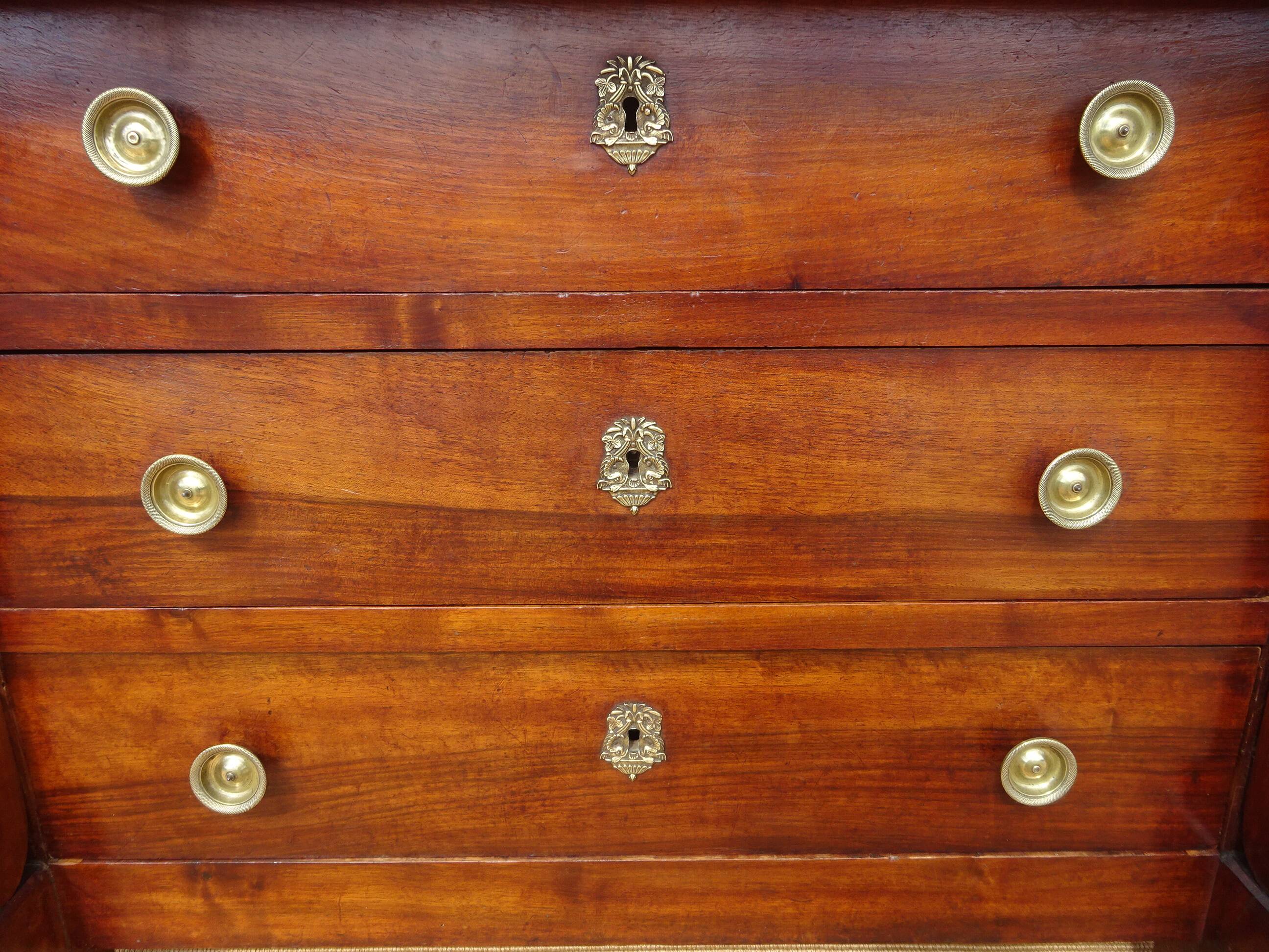 Antique solid walnut chest of drawers with scrolls