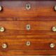 Antique solid walnut chest of drawers with scrolls