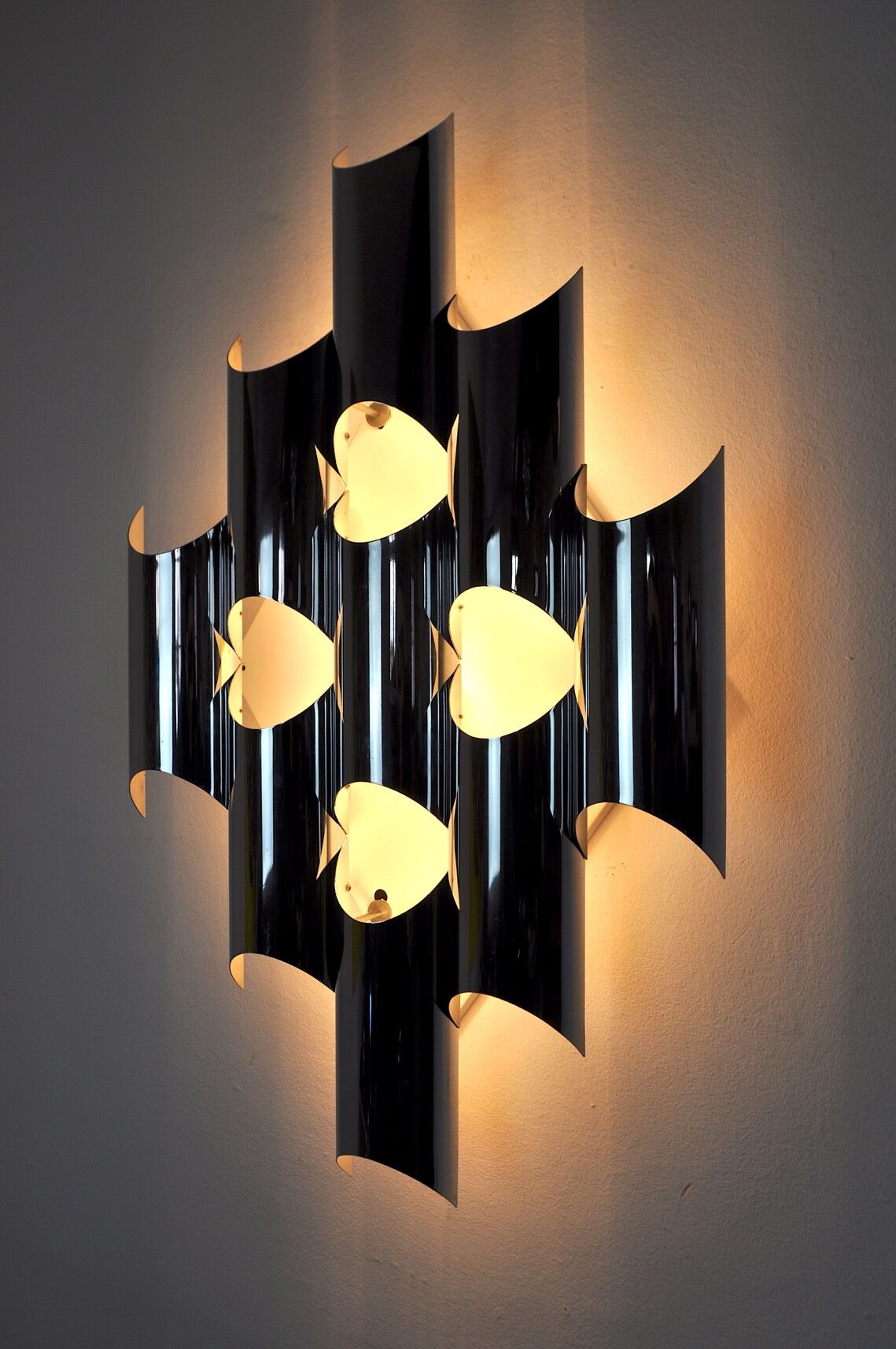 Space-age chrome wall lamp by RAAK, 8 lights, Germany, 1970