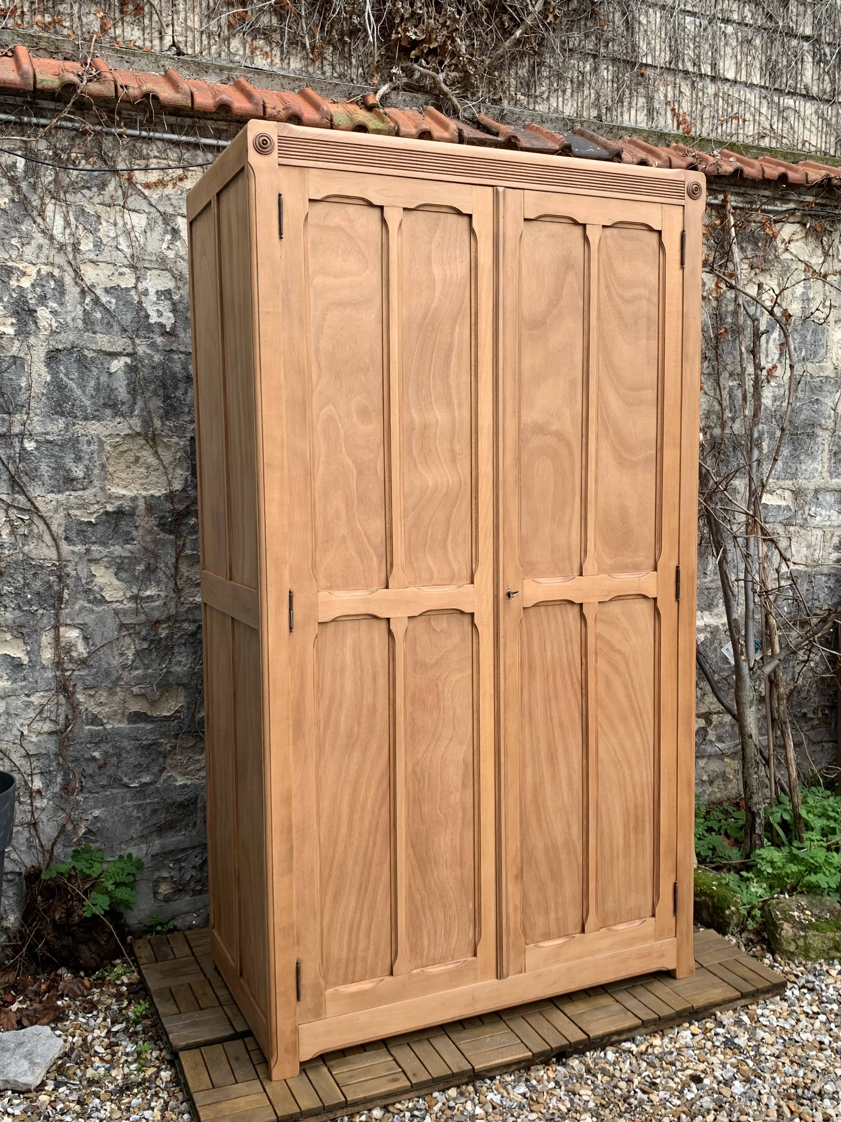 Parisian paneled cabinet in raw wood, 1940