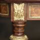 Superb Napoleon III table. Marquetry top and gilded bronzes.