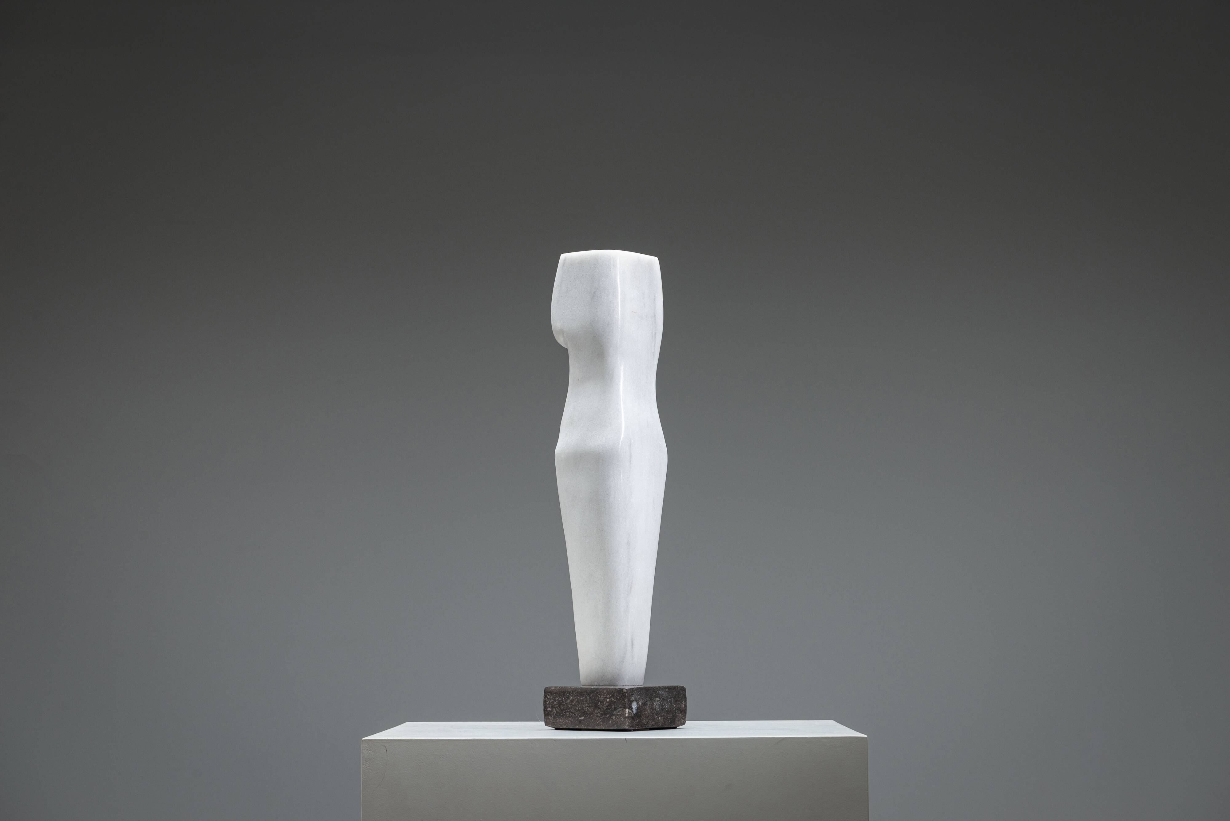 Abstract solid white marble torso