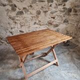Vintage folding garden table in pine, mid-20th century.