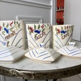 Trio of antique hand-painted ceramic pots (flour, sugar, coffee)