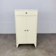 White wood convenient storage unit from the 1950s