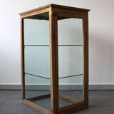 Showcase in oak and glass