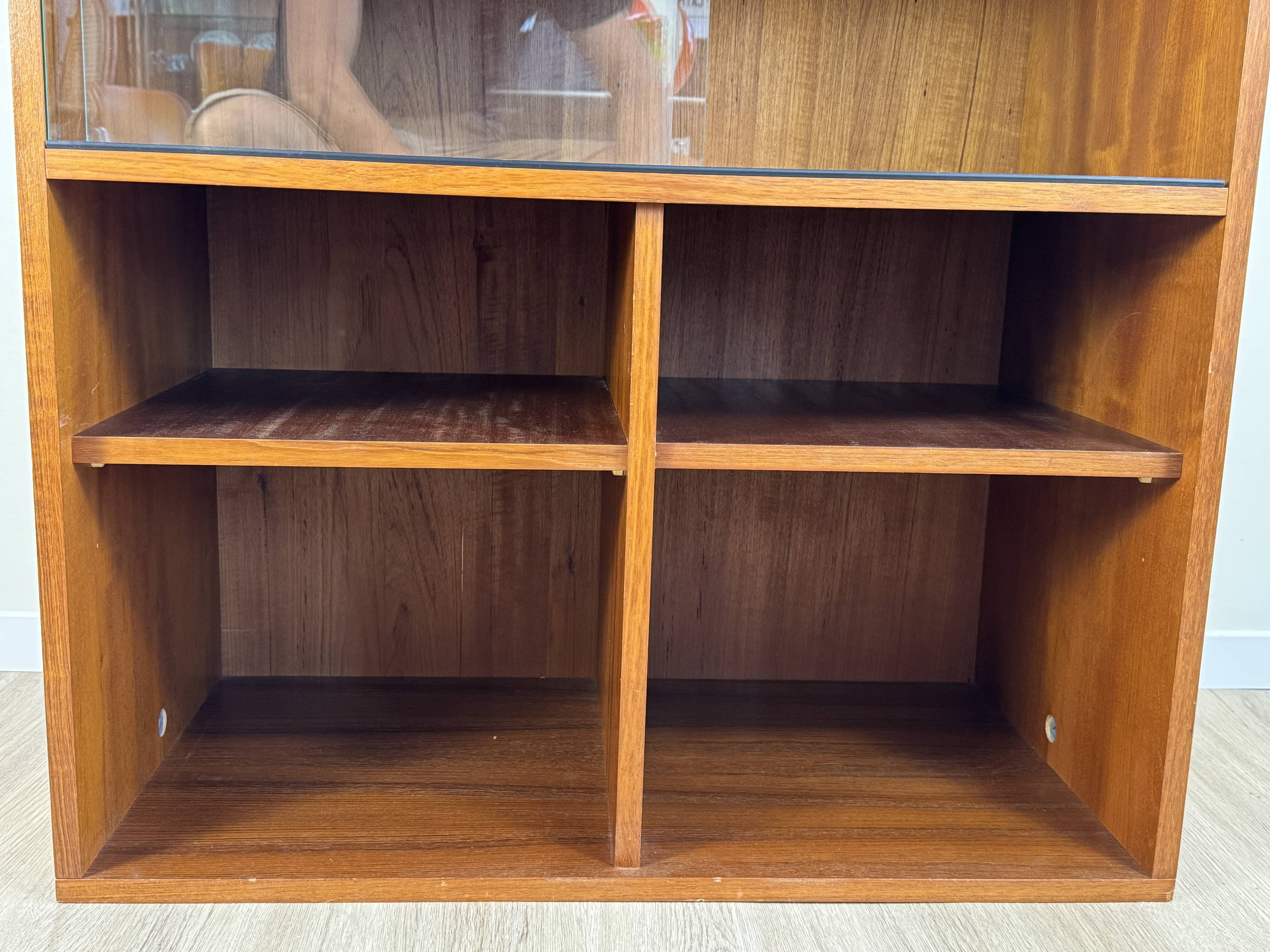 Teak bookshelf, sliding display + open storage, 60s/70s