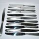 RENEKA Lot of 12 table knives with crossed ribbons and silver-plated metal, 24.5cm