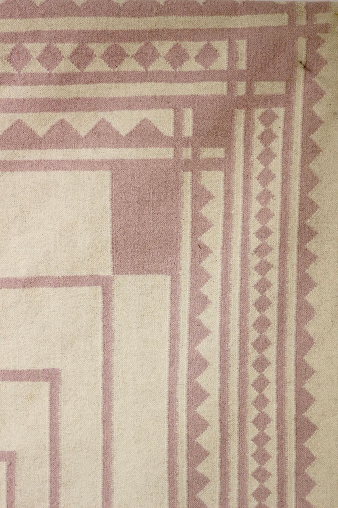 Carpet geometric design pastel colors pink and off-white year 70/80.