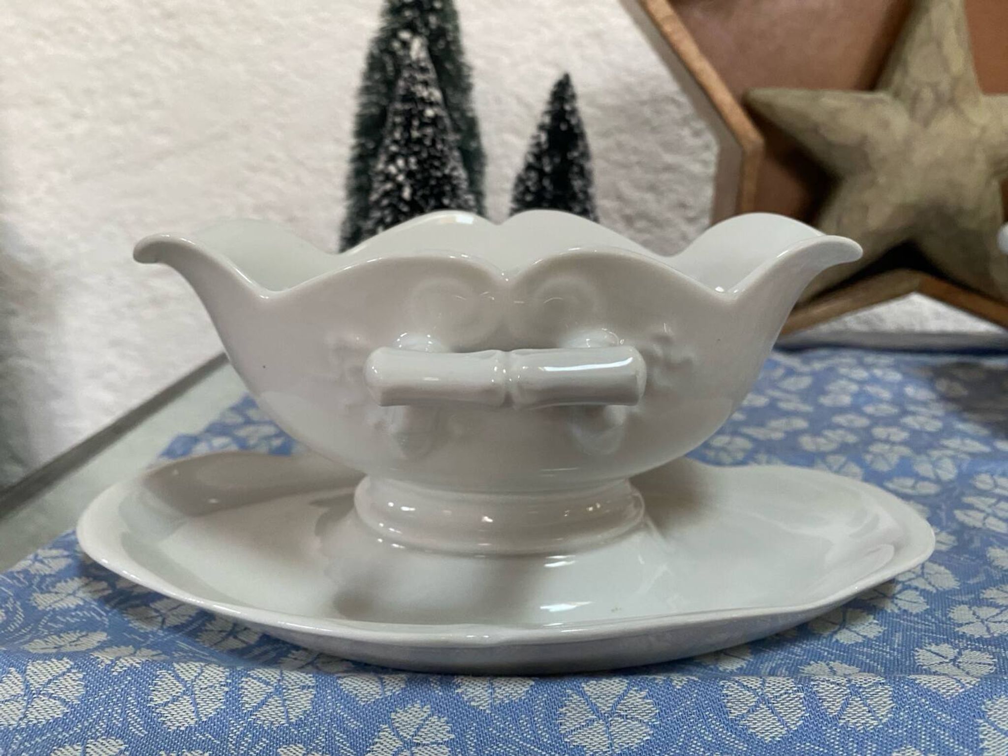 Antique porcelain sauce boat with bamboo pattern.