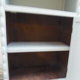 Vintage furniture of shallow depth re-enchanted in grey-green.