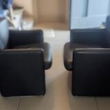 Pair of Tecno 148 leather armchairs