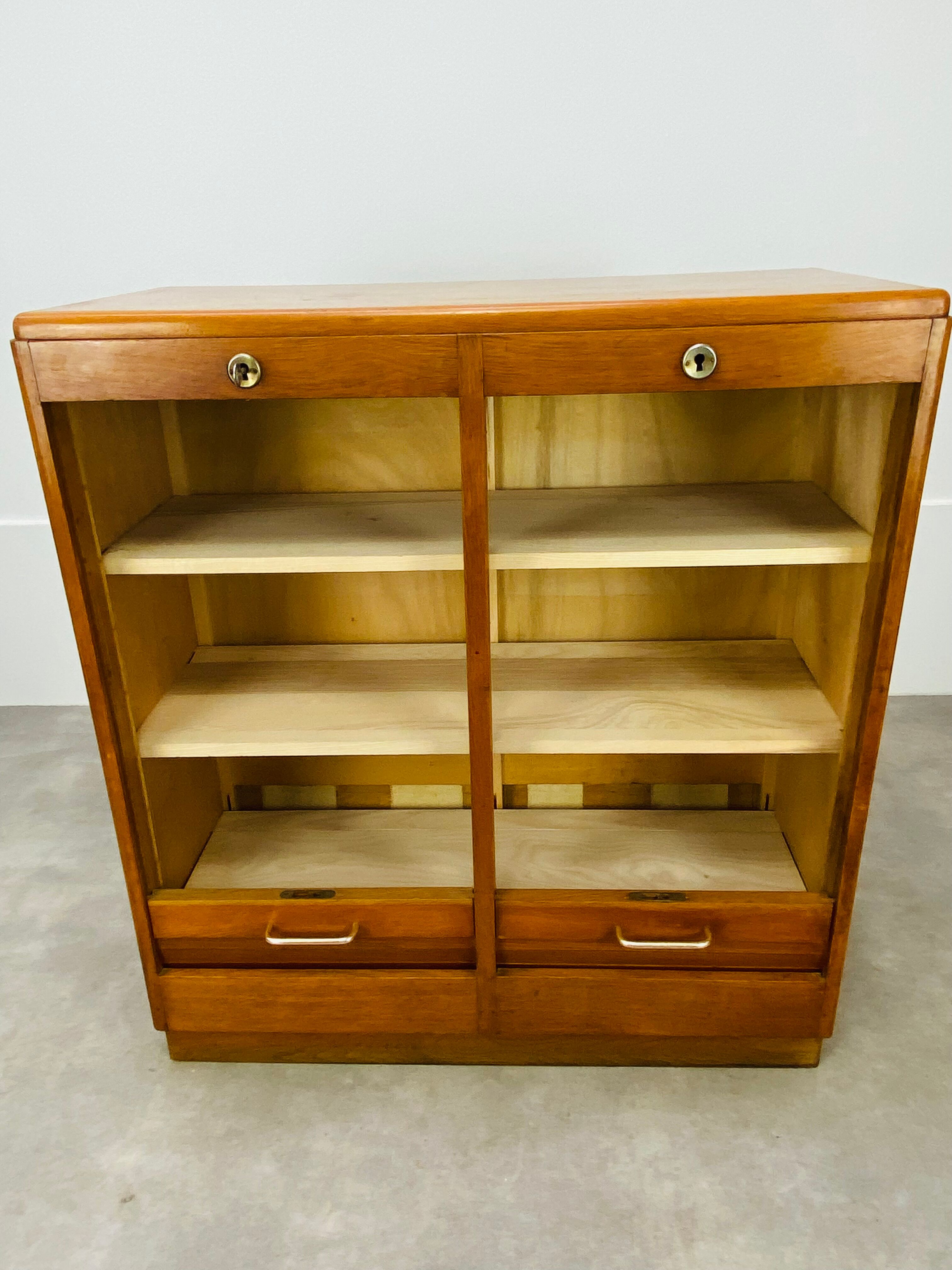 Double curtain binder cabinet