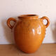 Old honey-glazed pot with two handles