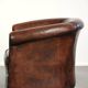 Vintage sheepskin club armchair with beautiful colours and a subtle size