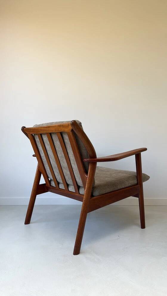 Vintage teak wooden armchair