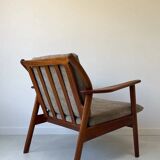 Vintage teak wooden armchair