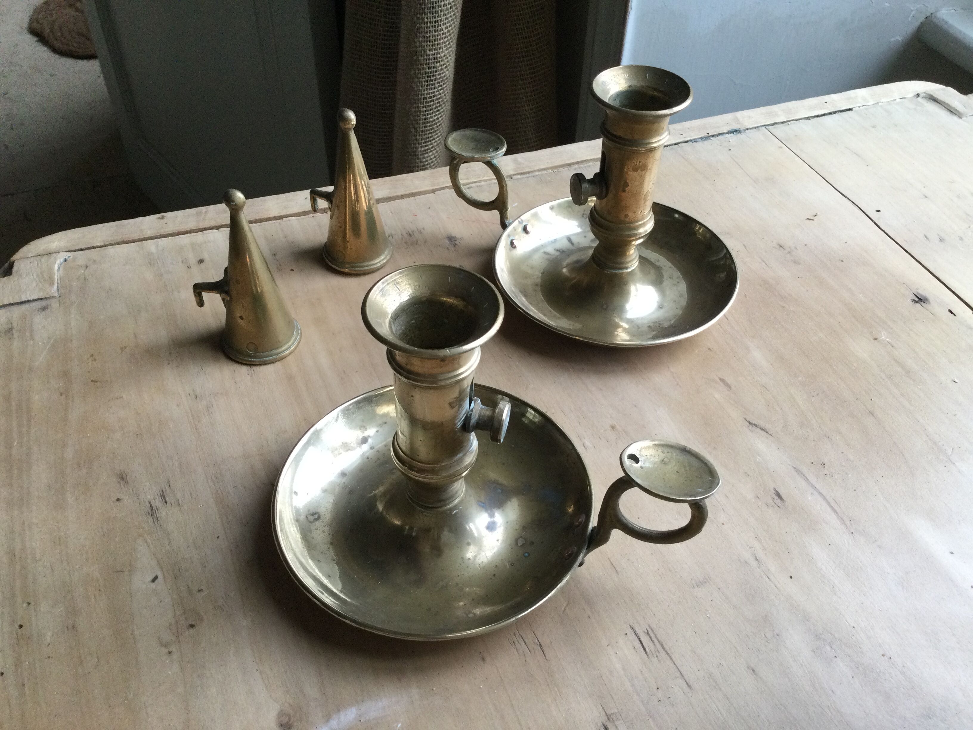 Pair of antique copper candle holders