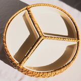 Compartment dish for appetizers, made of porcelain with a wicker support.