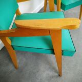 Pair of wood and vinyl armchairs