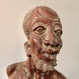 Bust Man in carved wood.
