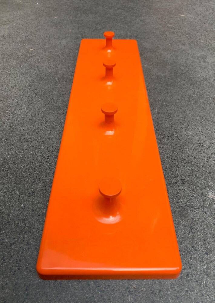 Orange coat rack from the mid-century space age, 1960s.